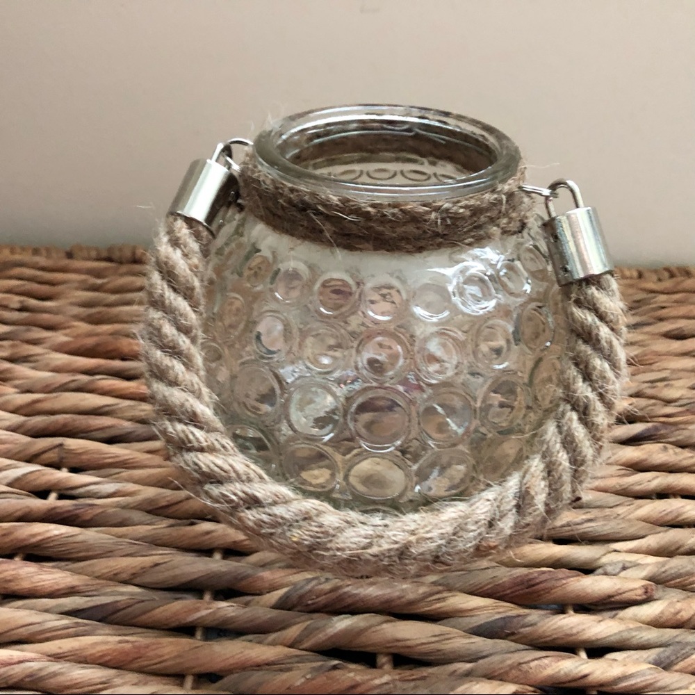 This little coastal glass lantern is the perfect accent in a nautical home